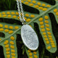 Moth and fuchsia pendant